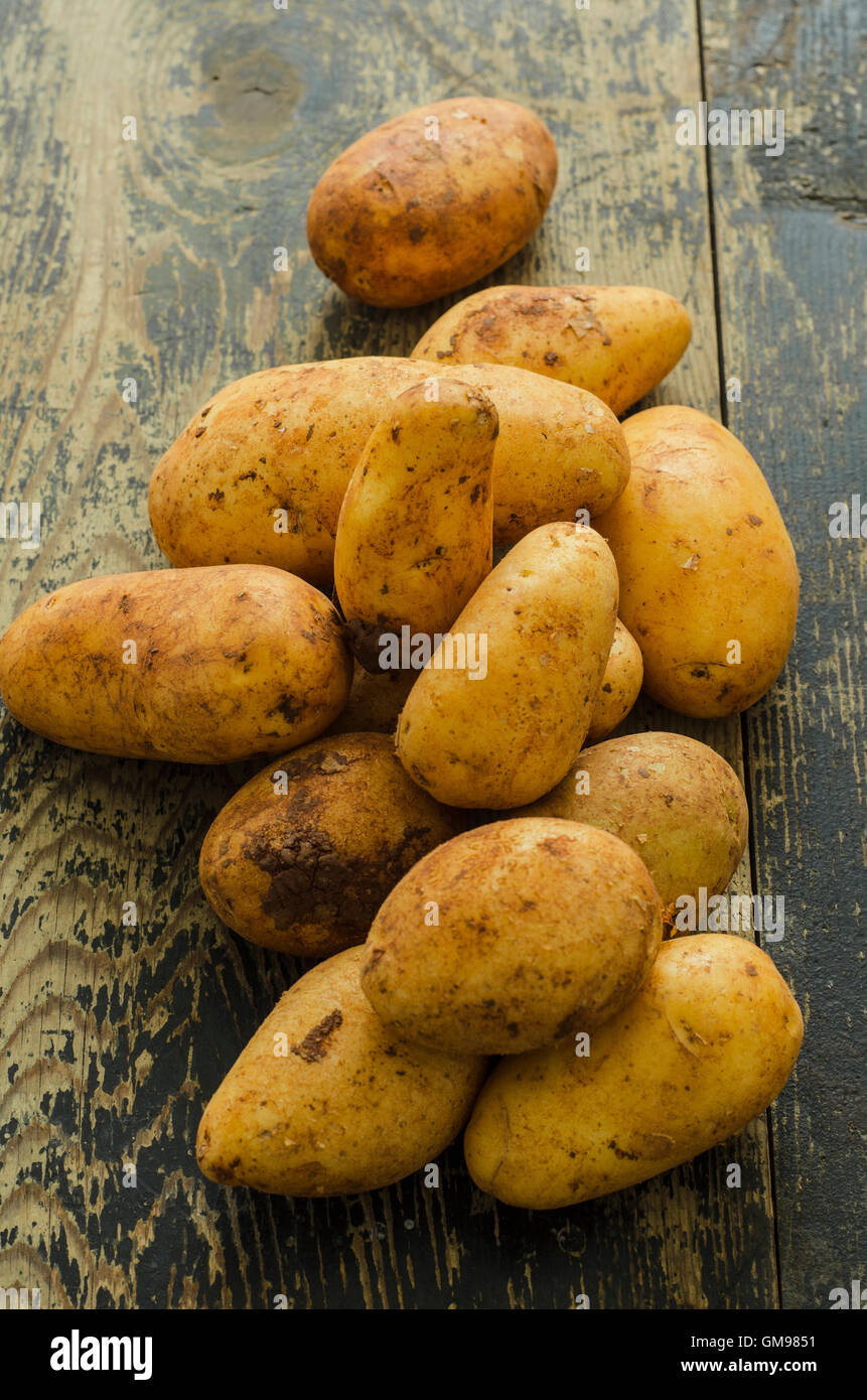 Waxy potatoes on wood Stock Photo
