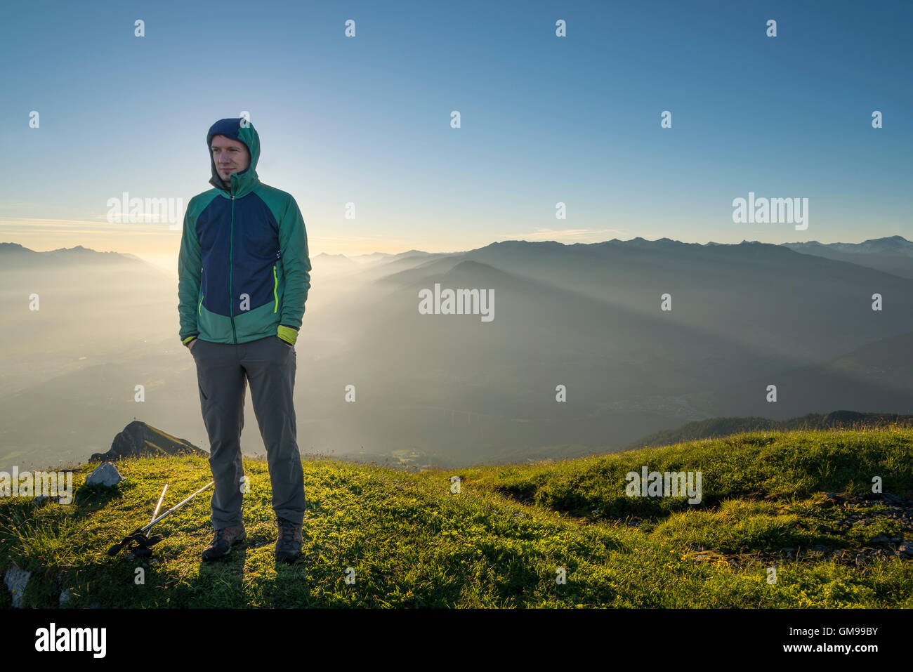 Hiker standing in moody hi-res stock photography and images - Alamy
