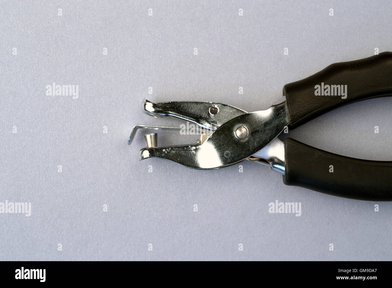 Hole puncher on a background, close up Stock Photo