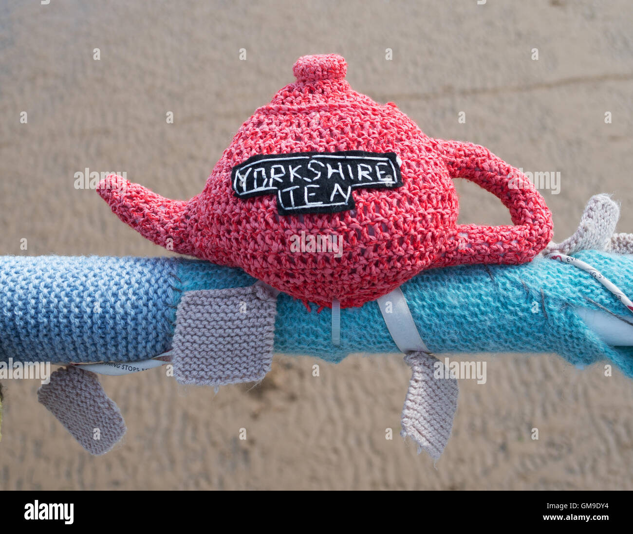 Knitted Yorkshire Tea teapot on the pier at Saltburn by the Sea, North Yorkshire, England, UK Stock Photo