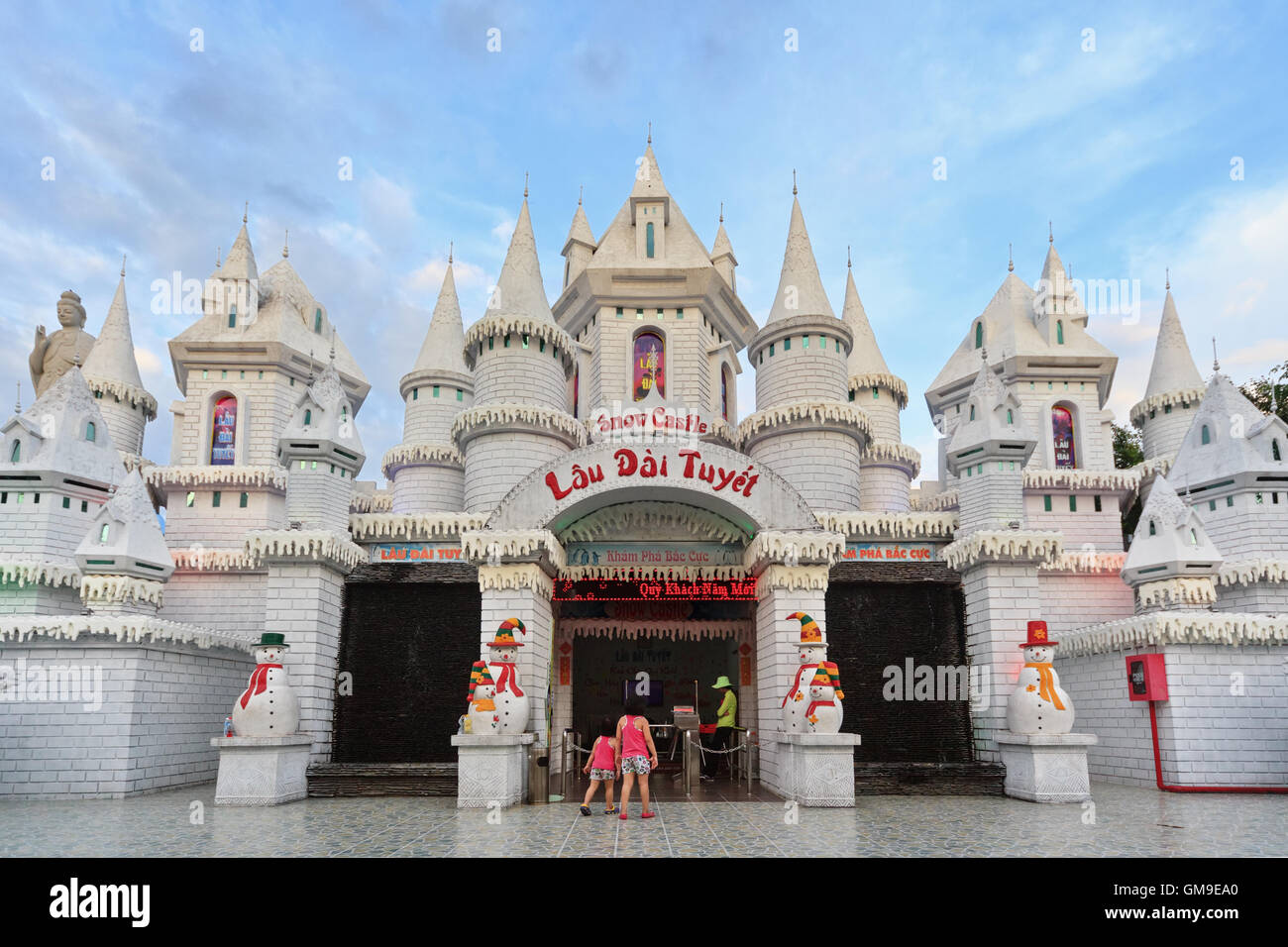 Ho Chi Minh city ( Saigon ), Vietnam - September 02, 2015: Two girls visit snow castle in children water park and historical the Stock Photo