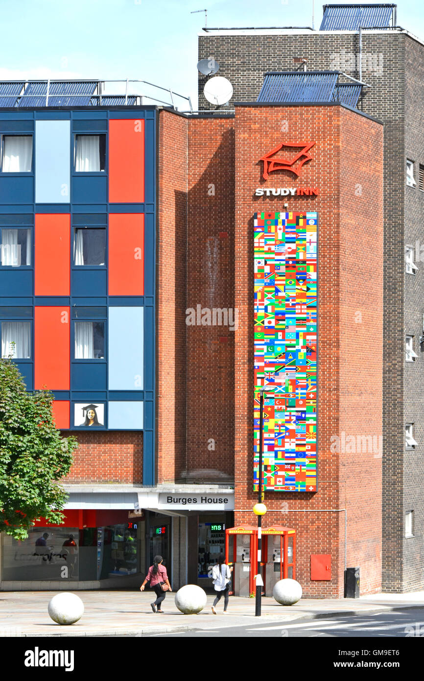 International flags on private sector halls of residence building in StudyInn student accommodation Coventry City Centre West Midlands England UK Stock Photo