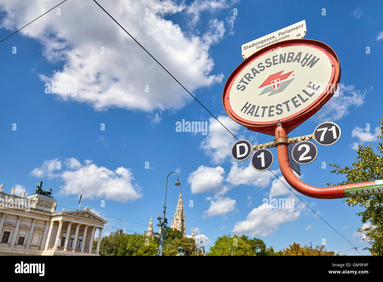 Tram stop sign in front of Austrian Parliament building. Stock Photo