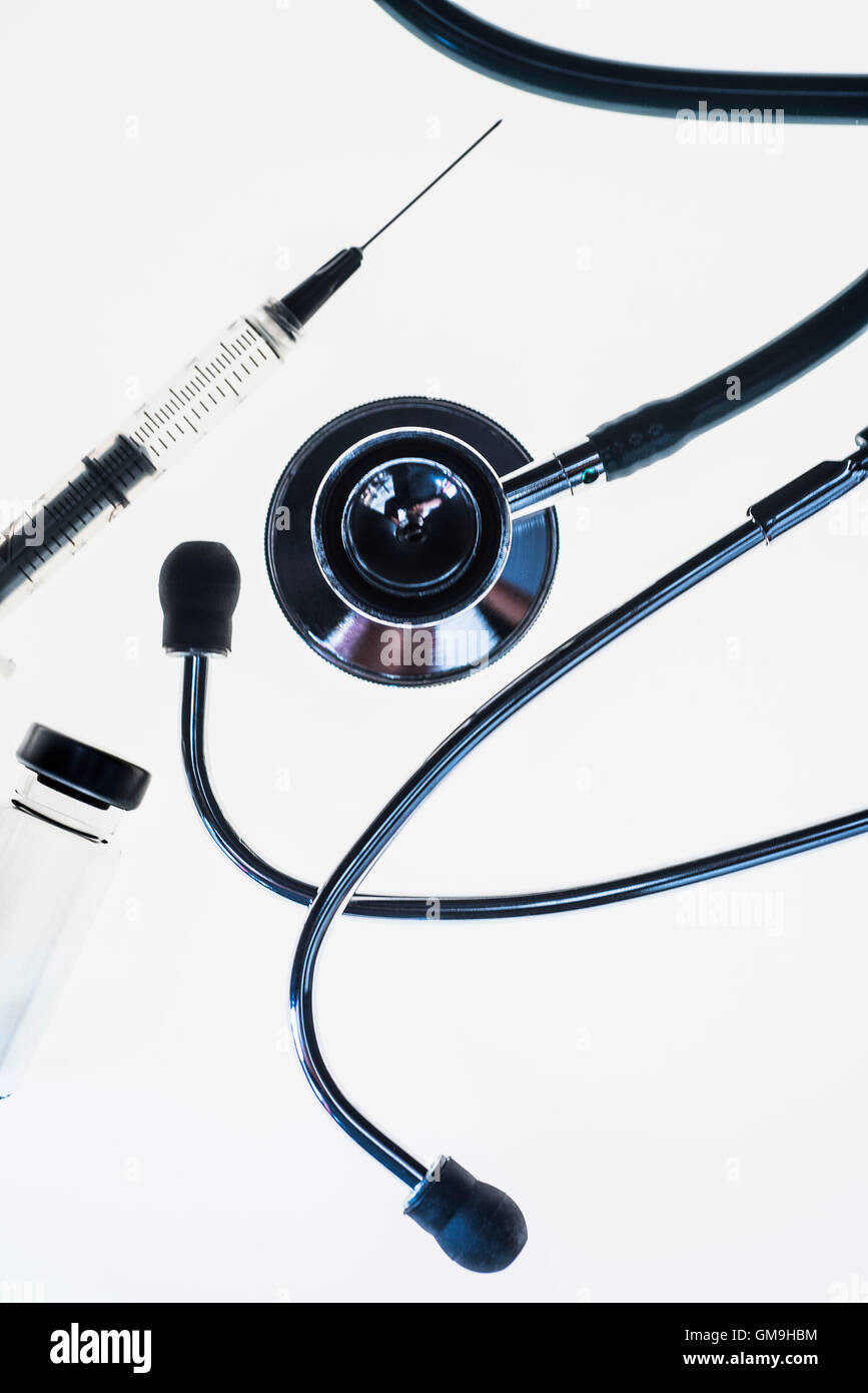 Stethoscope, syringe and test tube on white background Stock Photo - Alamy