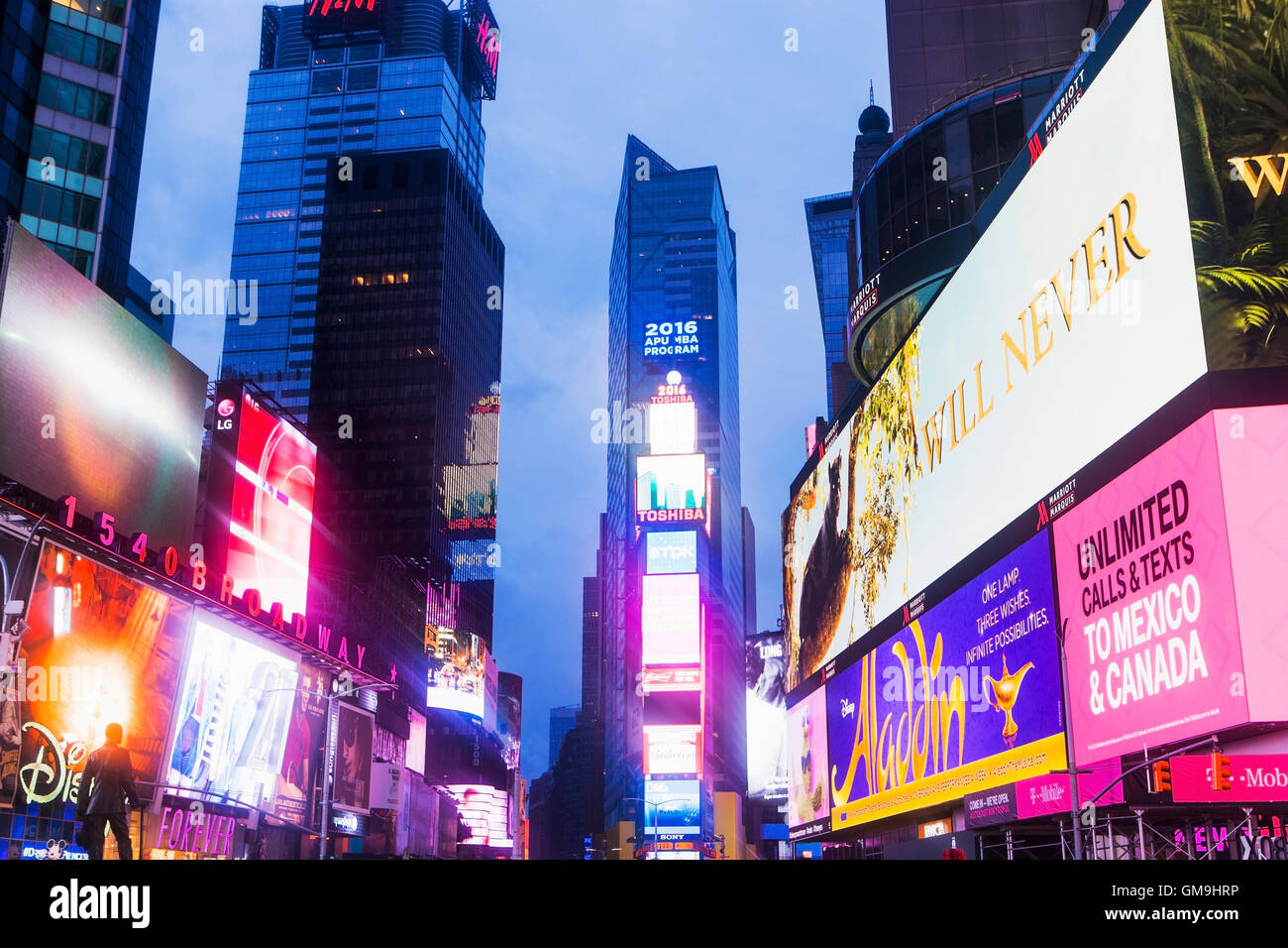 New York City, Times Square, Neon lights illuminating street Stock Photo