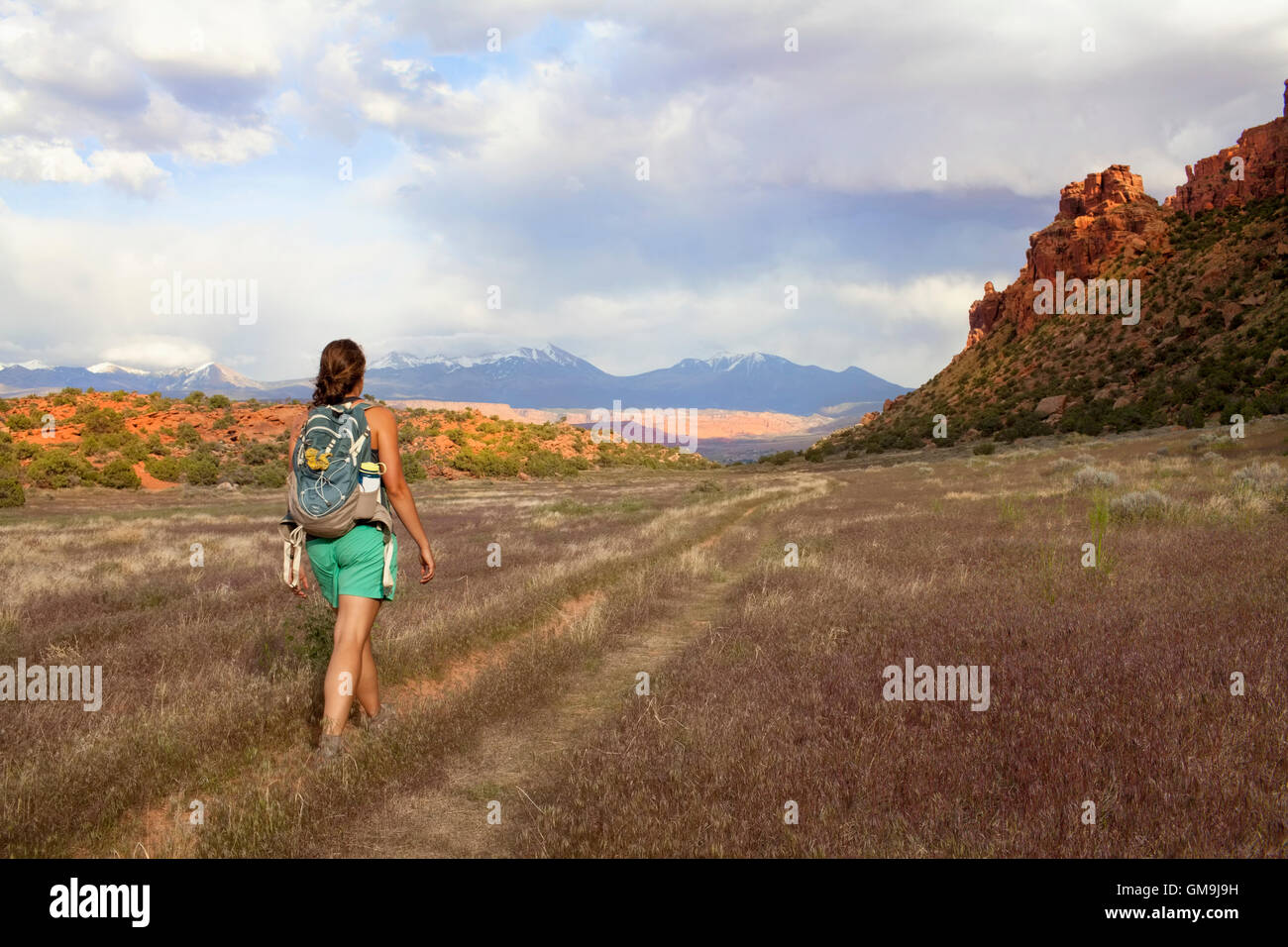 Woman backpack in nature hi-res stock photography and images - Alamy