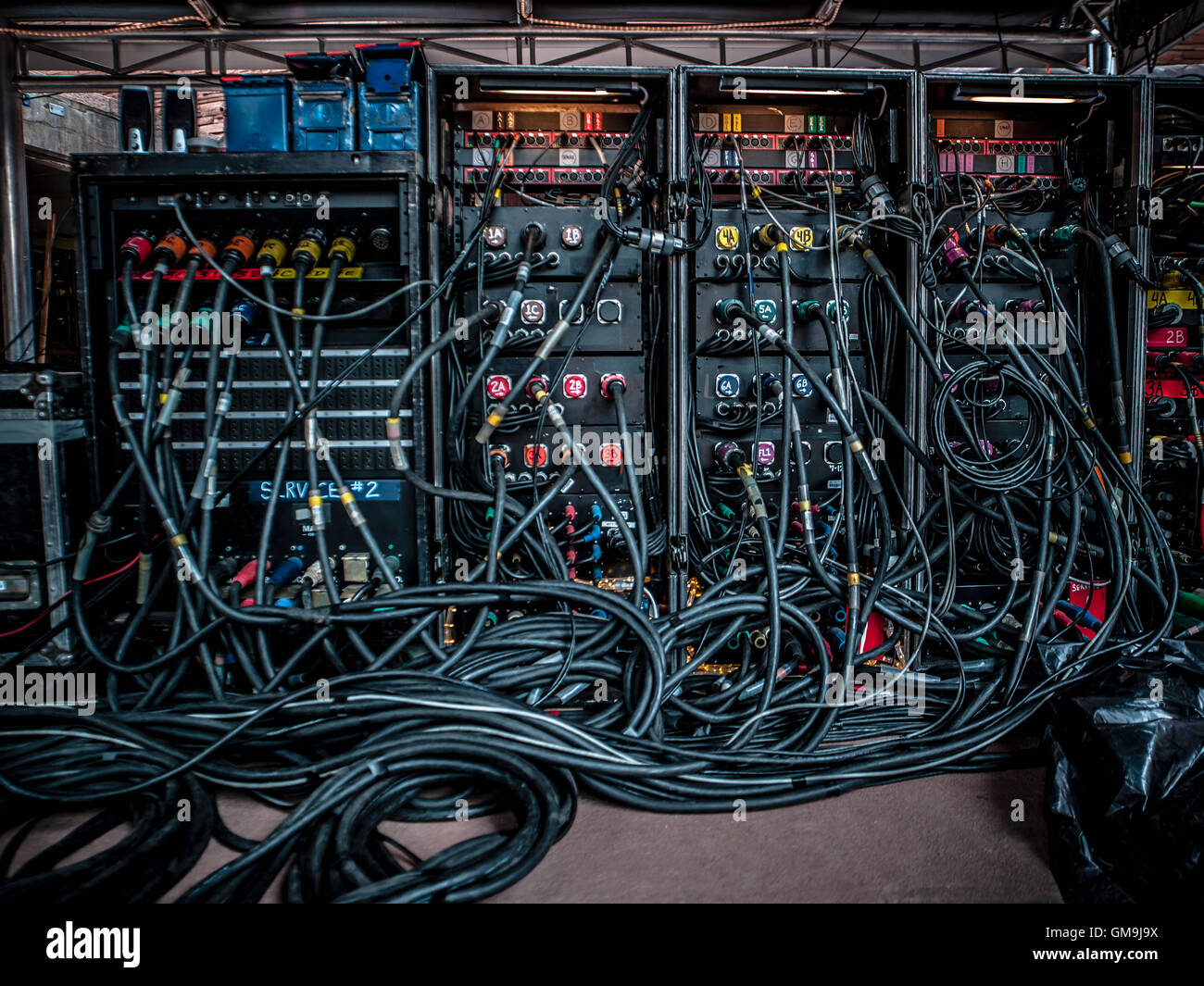 Rear view of amplifiers and cables Stock Photo