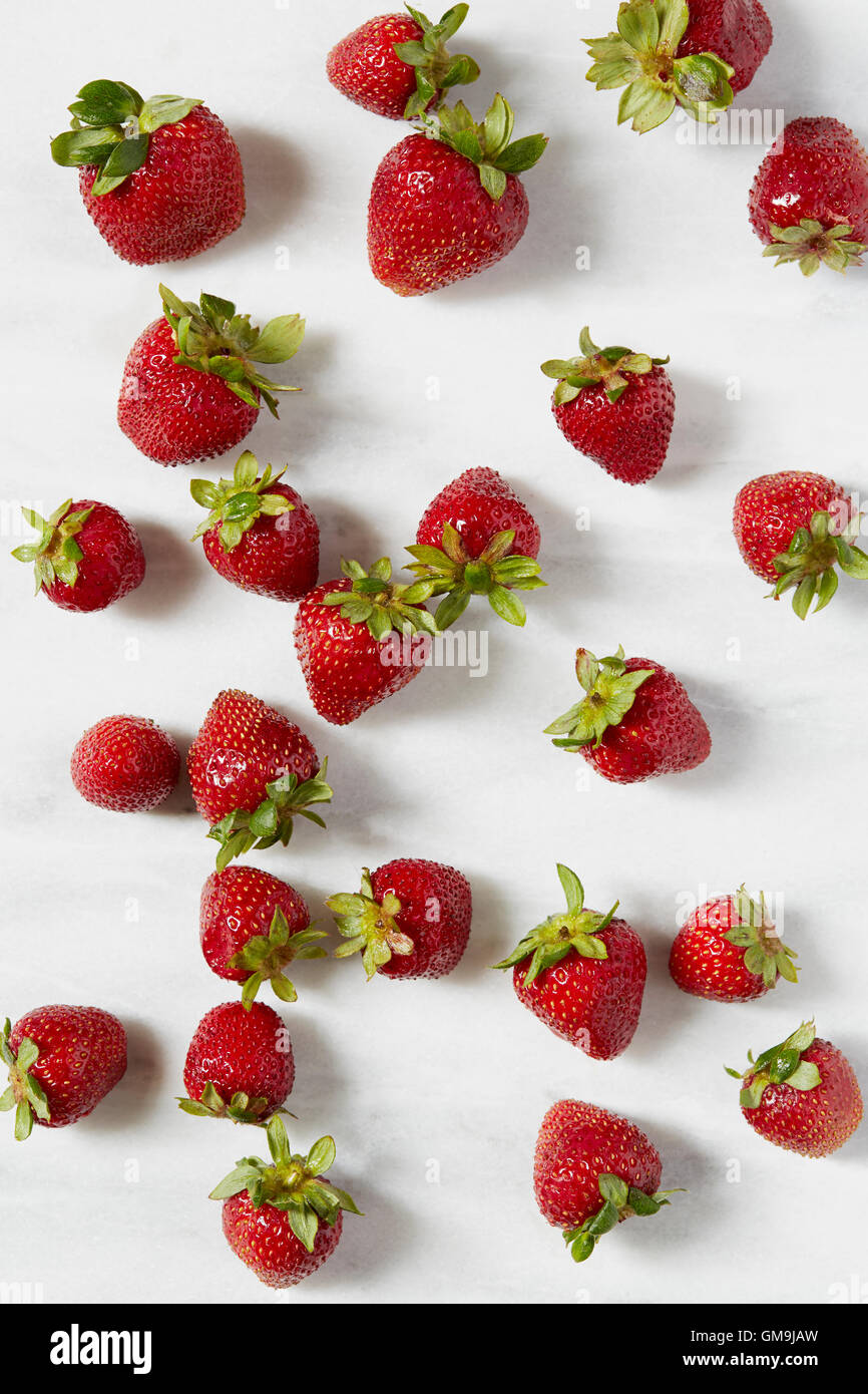 Group of people eating strawberries hi-res stock photography and images ...
