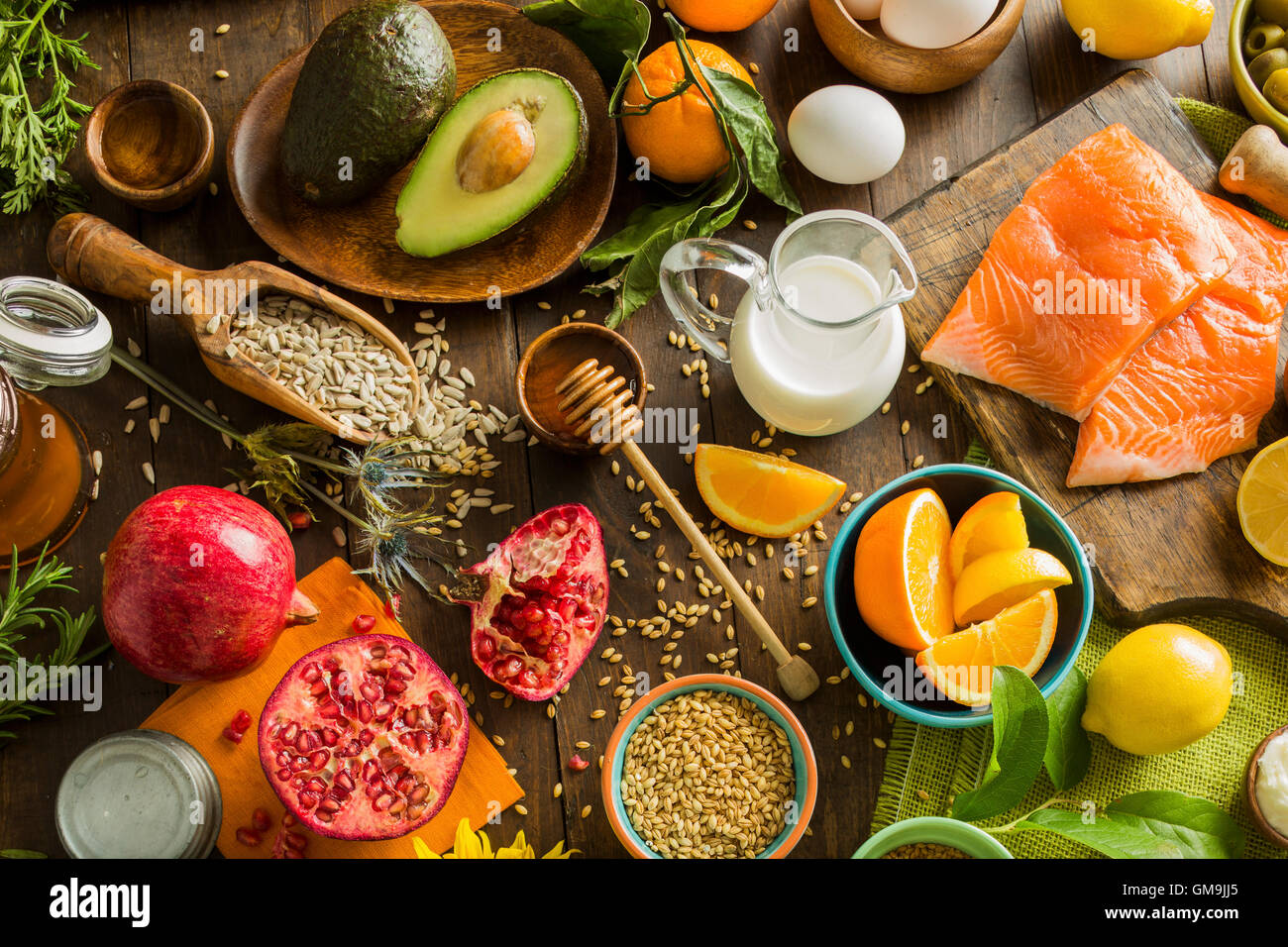 Overhead view of messy table with various fruits and seeds Stock Photo