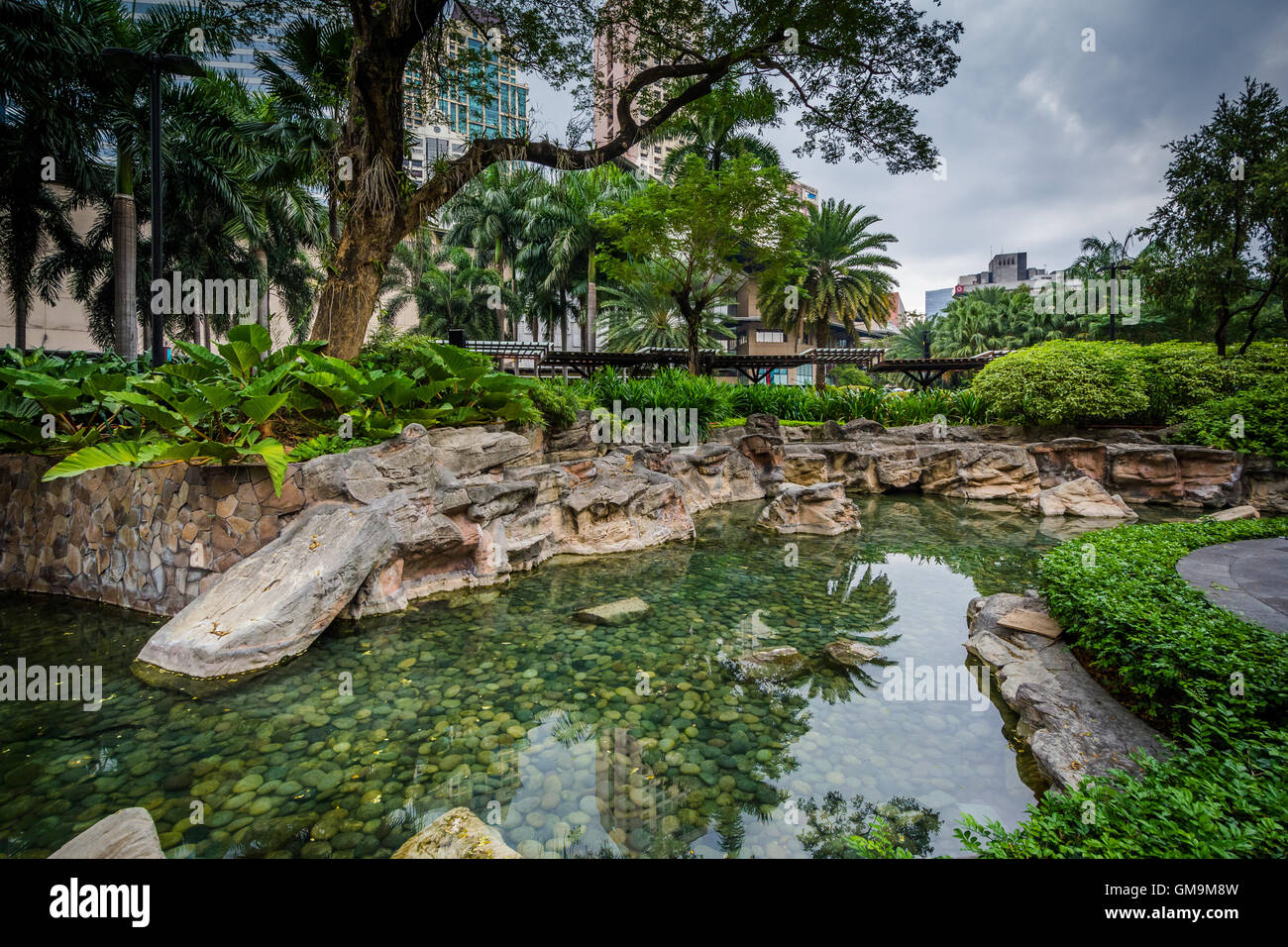 Pond at Greenbelt Park, Makati, Metro Manila, The Philippines. Stock Photo