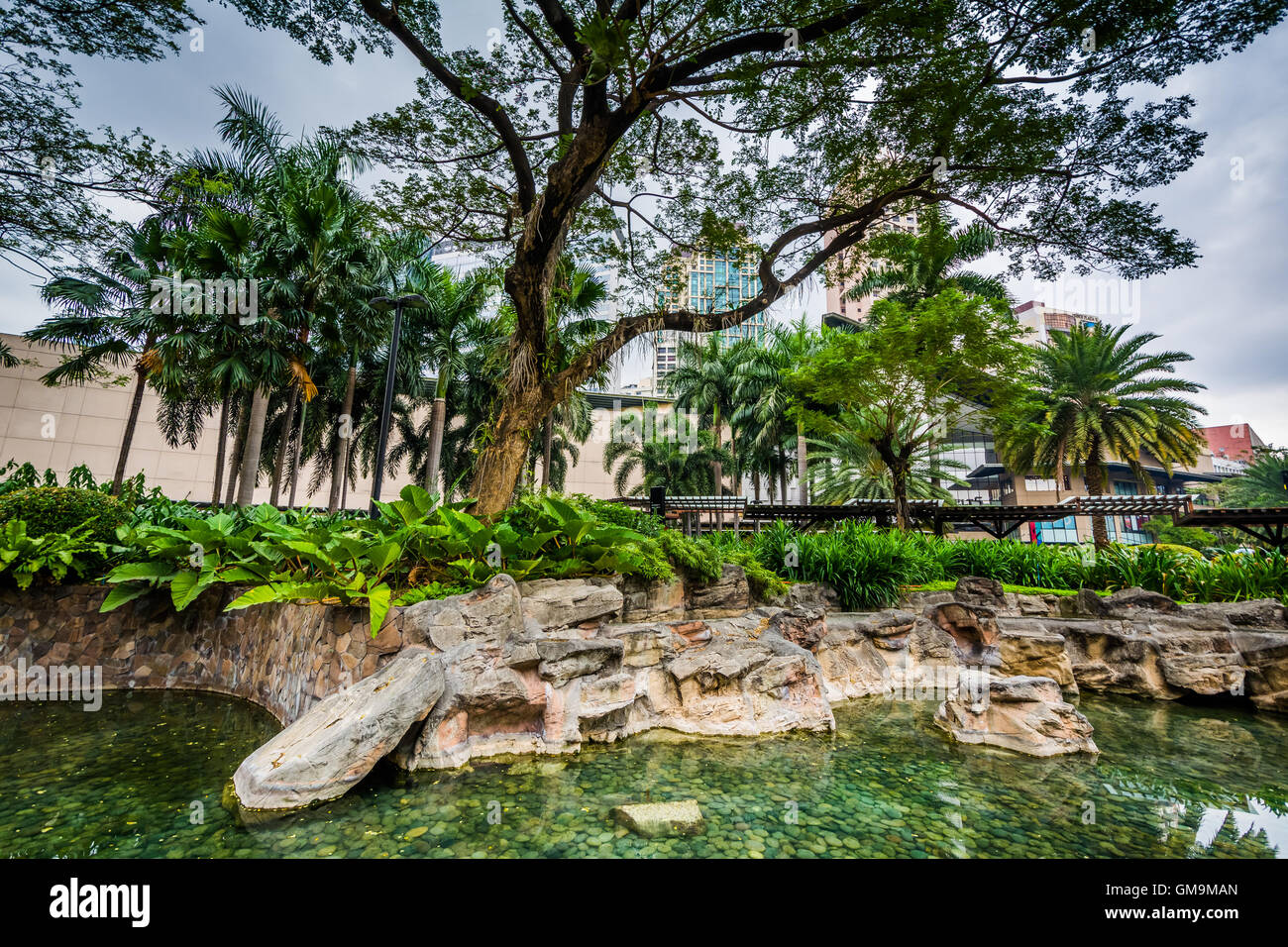 Gardens and skyscrapers at Greenbelt Park, in Ayala, Makati, Metro Manila,  The Philippines Stock Photo - Alamy