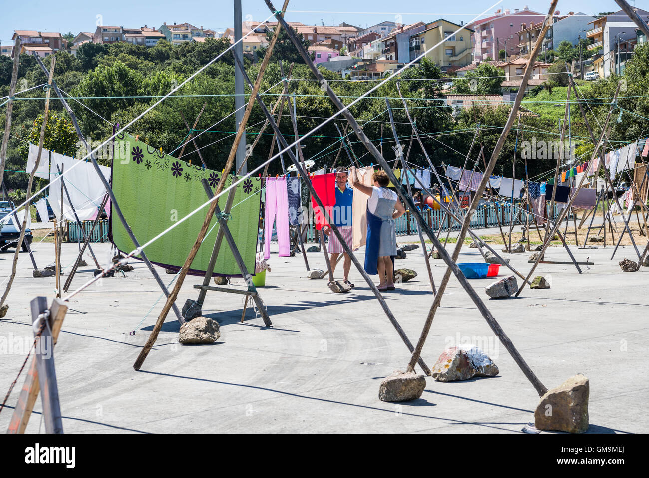 Local people of the small fishing village of Afurada, Portugal, hanging out washing to dry. Stock Photo