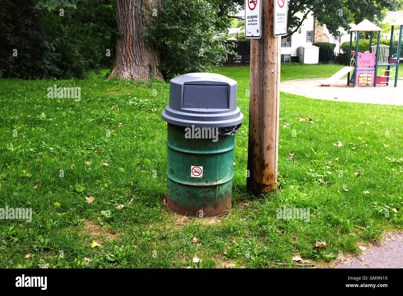A public bin by a playground in Ontario, Canada Stock Photo Alamy