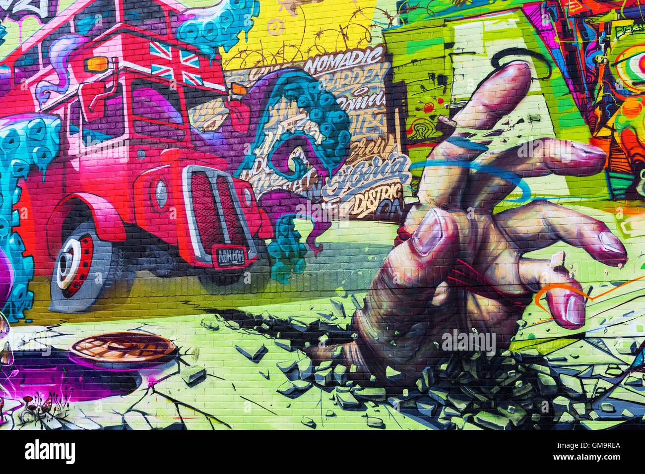 mural art on a wall in the city of London, UK Stock Photo Alamy