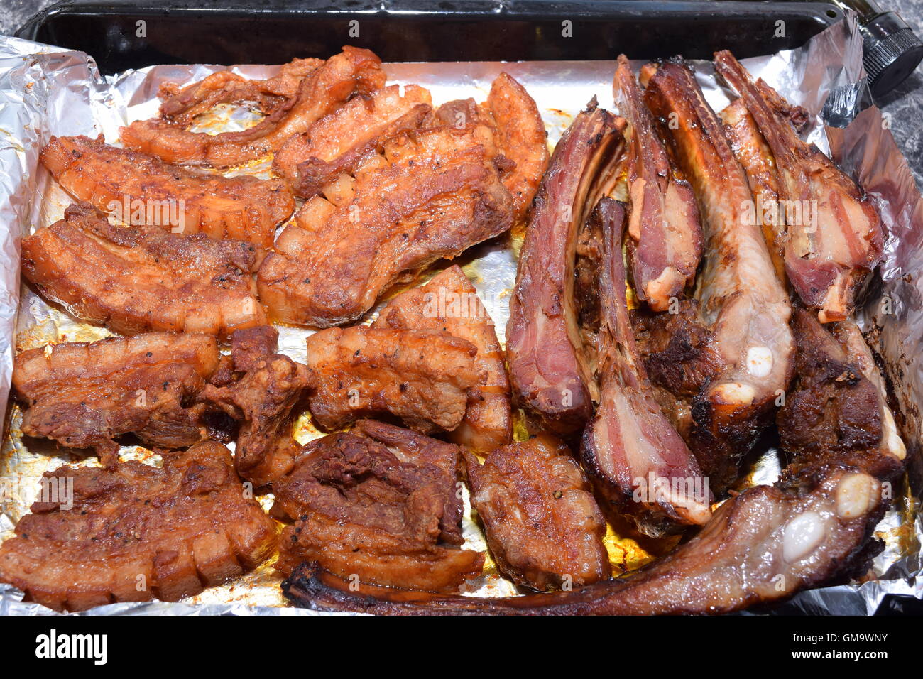 Cooked Pork in a Baking Tray Stock Photo Alamy