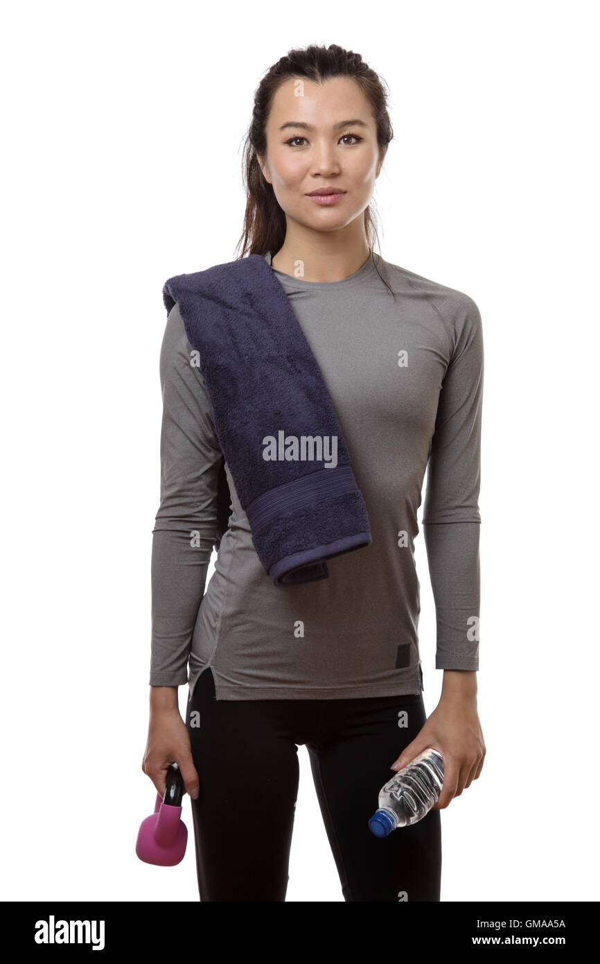 female with a towel over her shoulder Stock Photo Alamy