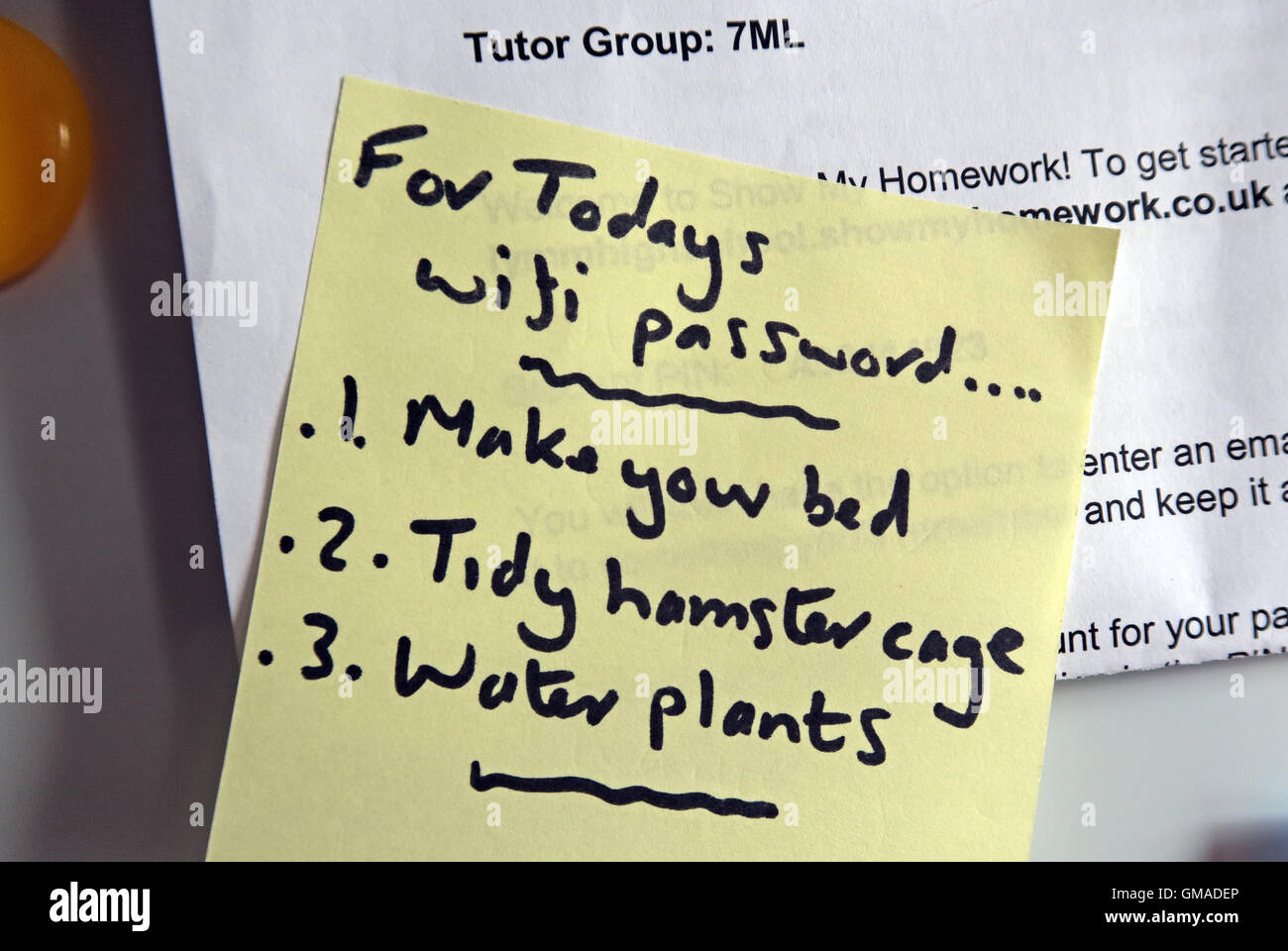 Home WiFi chores, needed to be done, on a PostIt Stock Photo