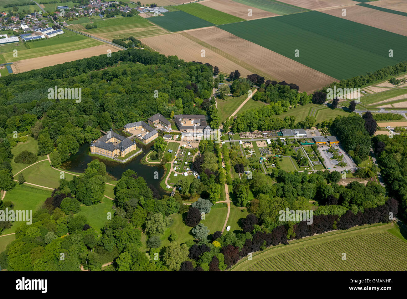 Aerial view, water castle of the city Juchen, Jüchen, Rhineland, two forecourts, parking facilities, an English landscape garden Stock Photo