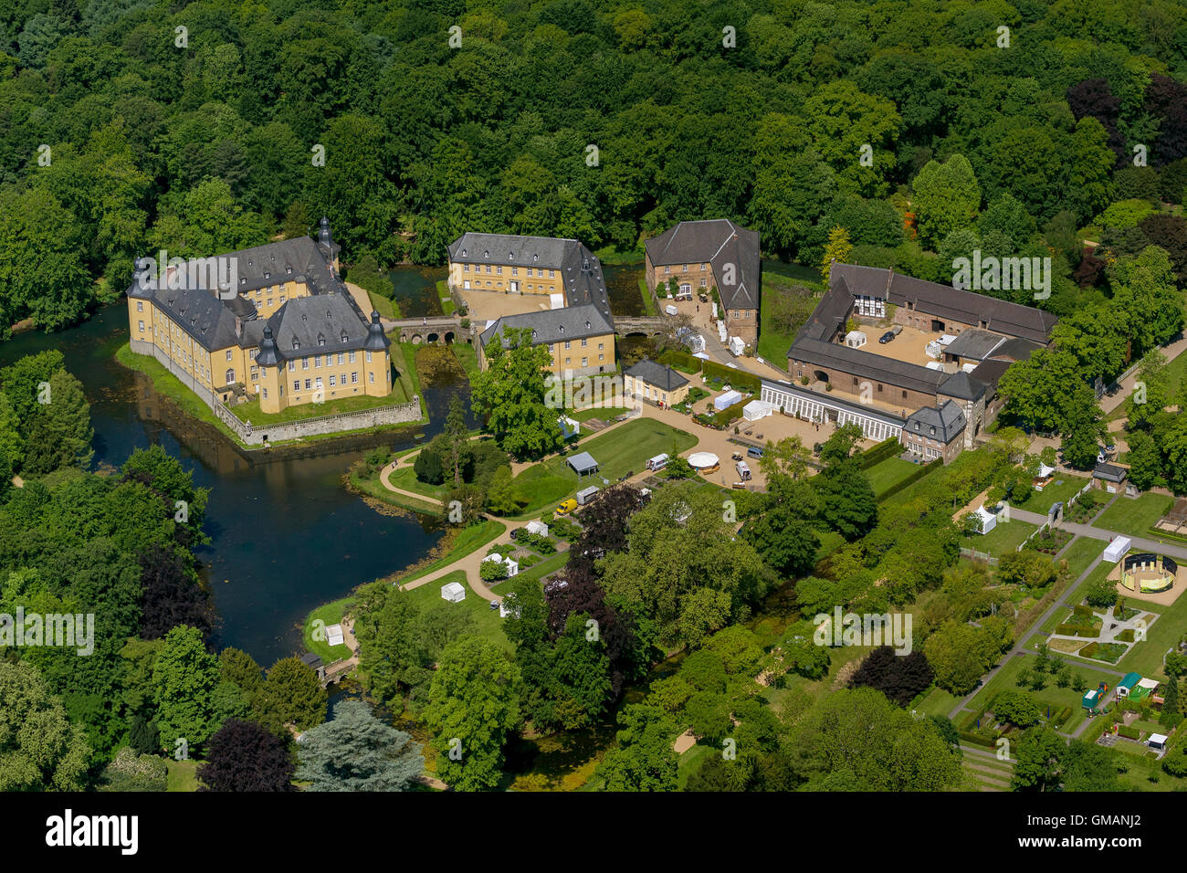 Aerial view, water castle of the city Juchen, Jüchen, Rhineland, two forecourts, parking facilities, an English landscape garden Stock Photo