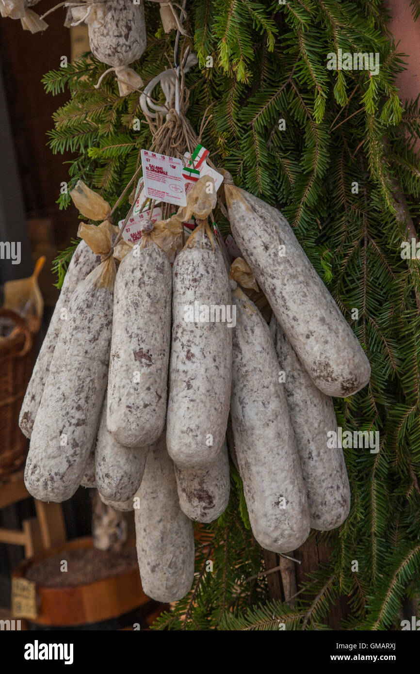 Sausages hanging outside a shop in Norcia in Umbria in Italy before the august 2016 earthquake Stock Photo