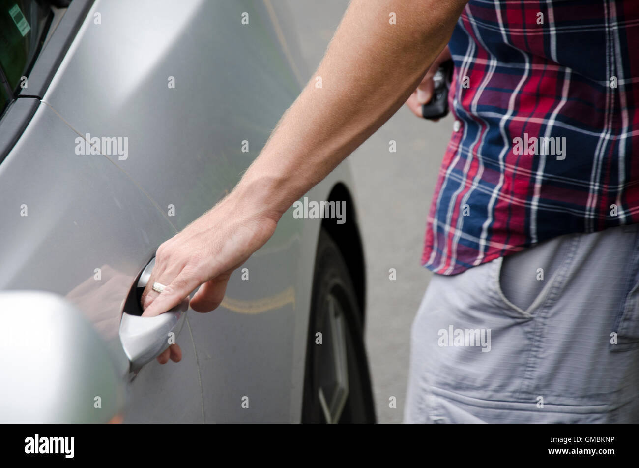 Opening car door other hand hires stock photography and images Alamy