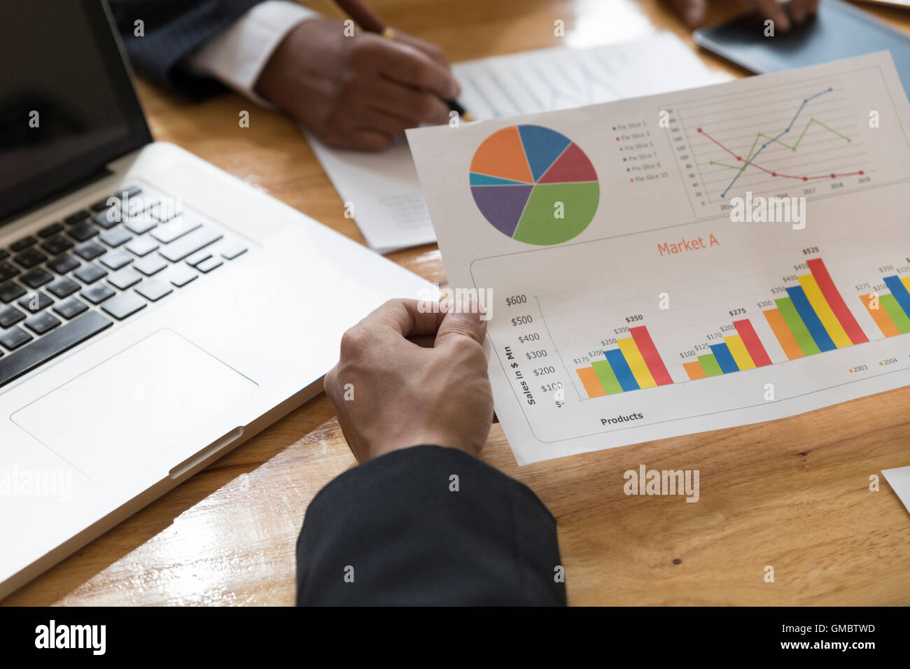 businessman meeting, analyzing and discussing with computer and ...