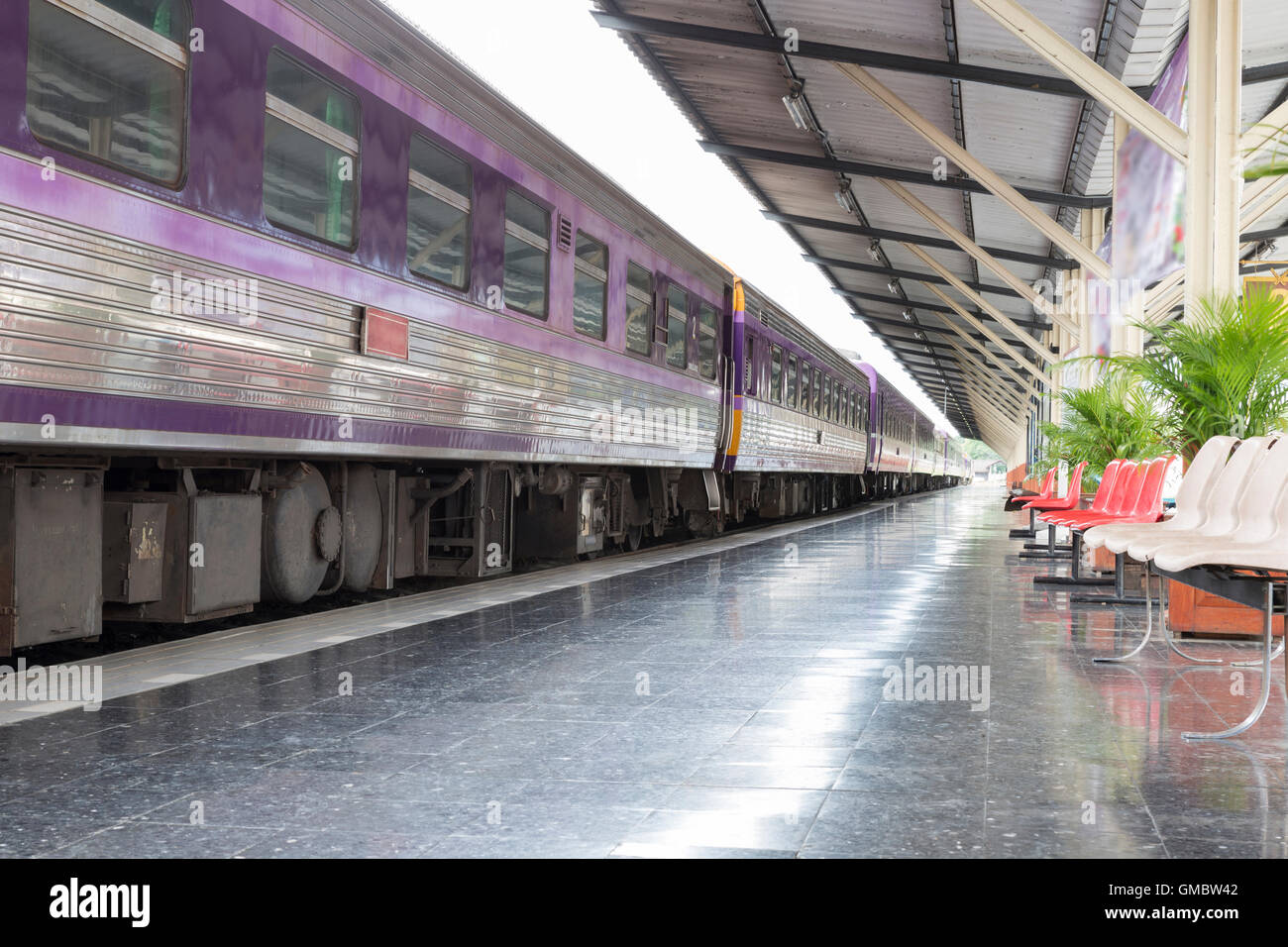 train parking on railway at train station Stock Photo Alamy