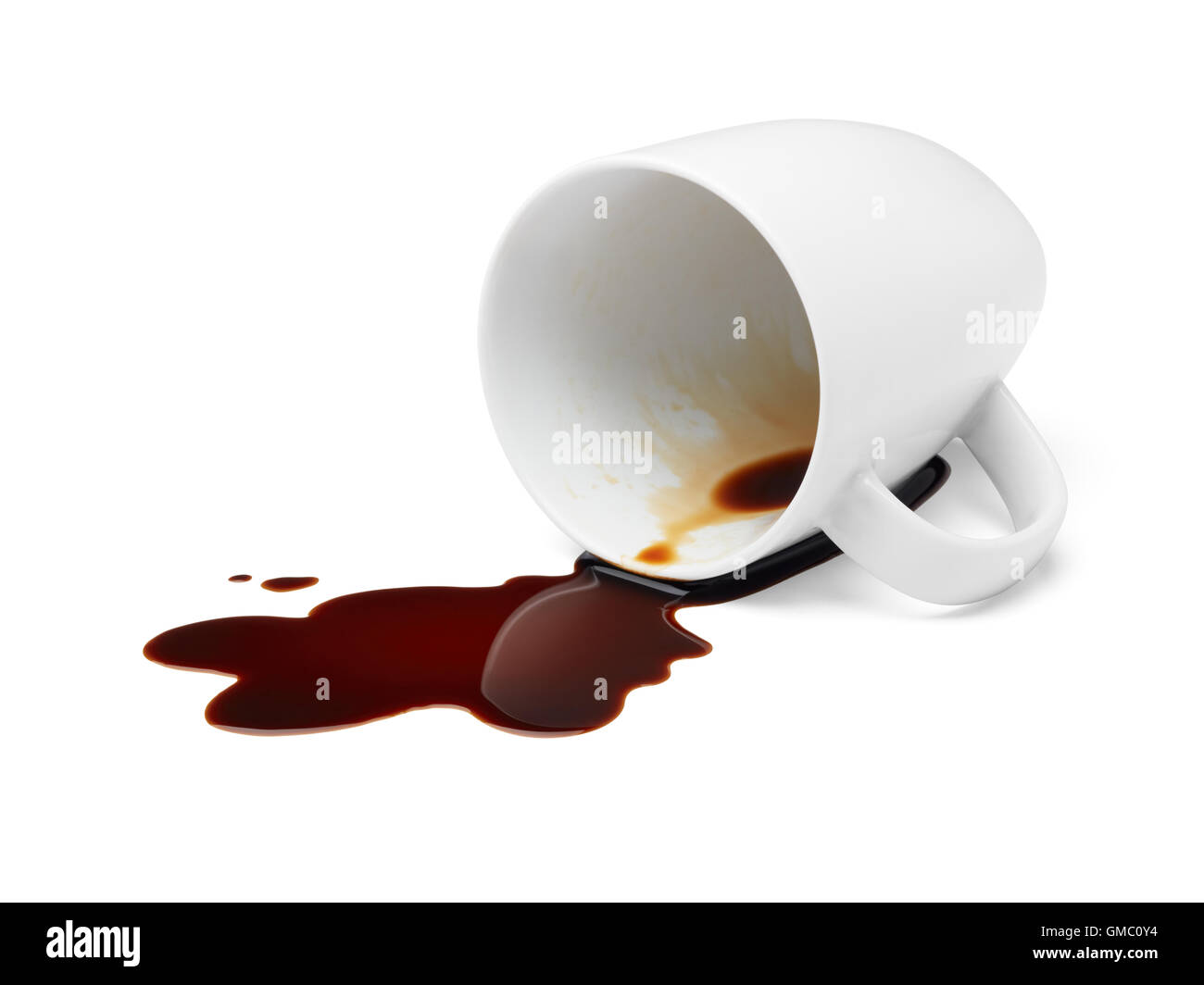 cup of black coffee spilling causing stained Stock Photo