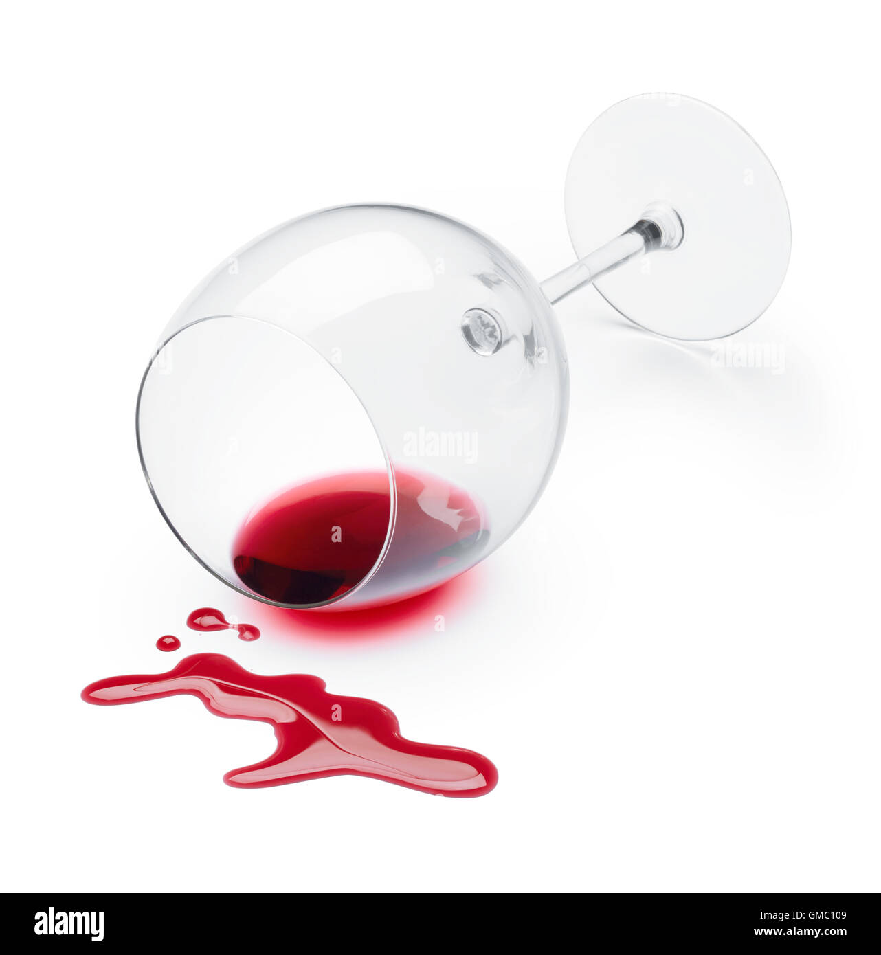 wine glass and spilled red wine Stock Photo