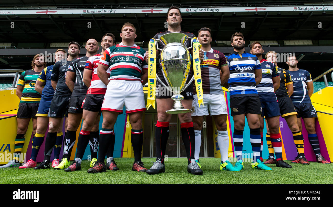 (left to right) Tom Wood of Northampton Saints, Gerrit-Jan Van Velze of Worcester Warriors, Ally Hogg of Newcastle Falcons, Jack Yeandle of Exeter Chiefs, Greig Laidlaw of Gloucester Rugby, Tom Youngs of Leicester Tigers, Brad Barritt of Saracens (centre), Danny Care of Harlequins, Guy Mercer of Bath Rugby, Jack Lam of Bristol Rugby, Joe Launchbury of Wasps and Josh Beaumont of Sale Sharks pose with the trophy during the Aviva Premiership season launch at Twickenham, London. Stock Photo