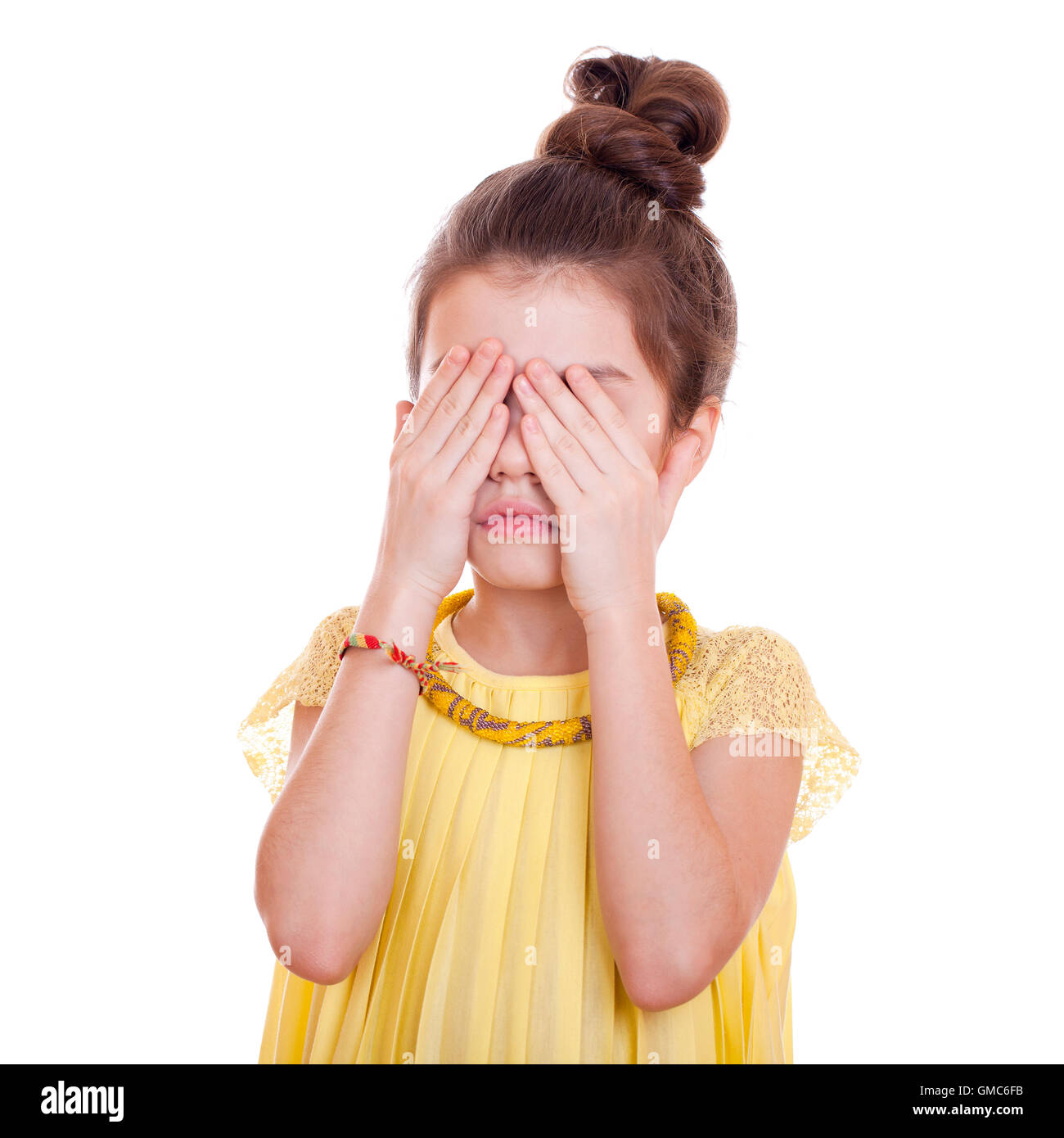 See No Evil, Hear No Evil, do not say anything, Portrait of beautiful little girl, studio on white background Stock Photo