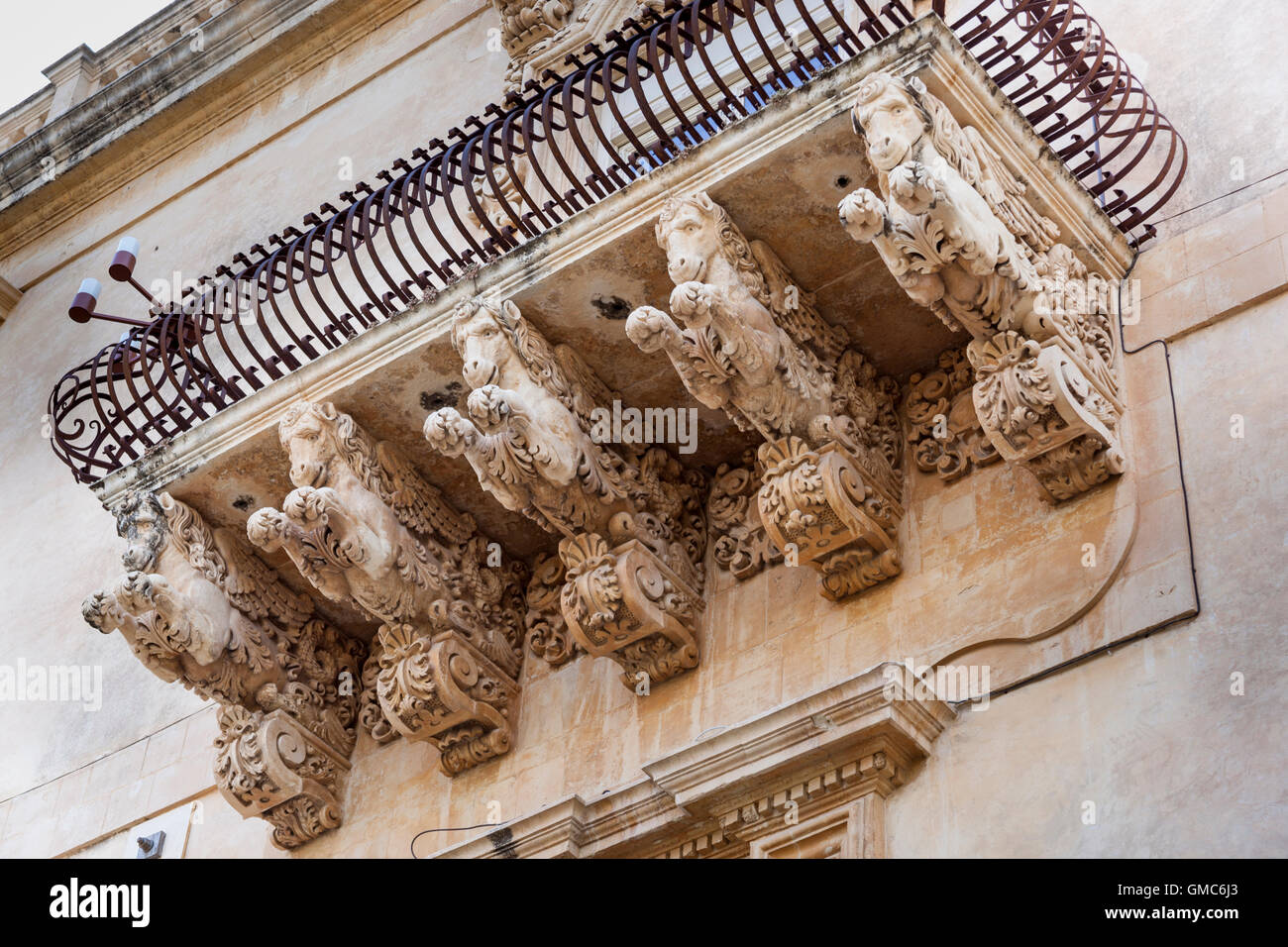 Baroque balcony, Palazzo Nicolaci Di Villadorata, Via Corrado Nicolaci, Noto, Sicily, Italy Stock Photo