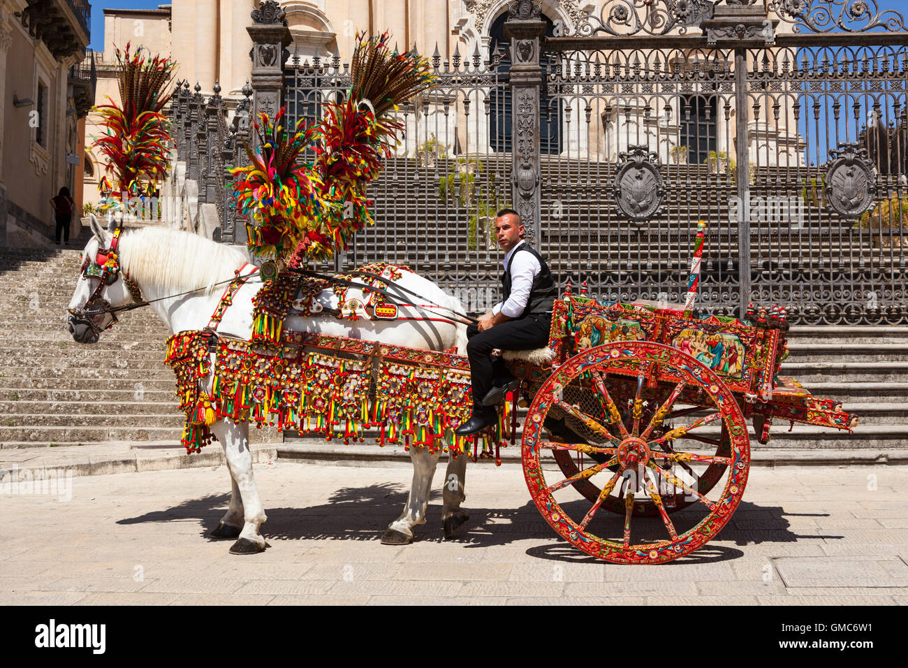 Horse and carriage outside Duomo of San Giorgio, Piazza Del Duomo, Ragusa Ibla, Ragusa, Sicily, Italy Stock Photo