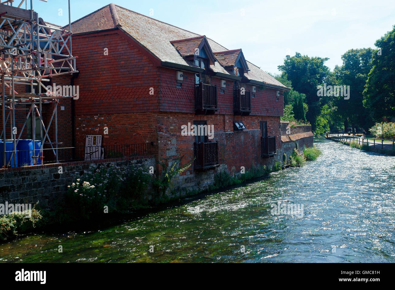 BUILDINGS ON THE ITCHEN WINCHESTER Stock Photo