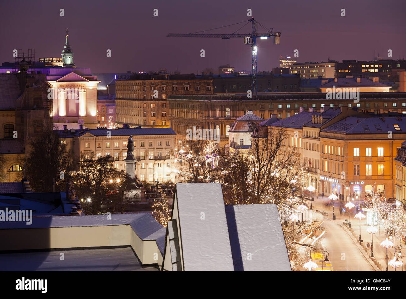 Capital city of Warsaw at night in Poland, buildings along Krakowskie Pzredmiescie street, Royal Route Stock Photo
