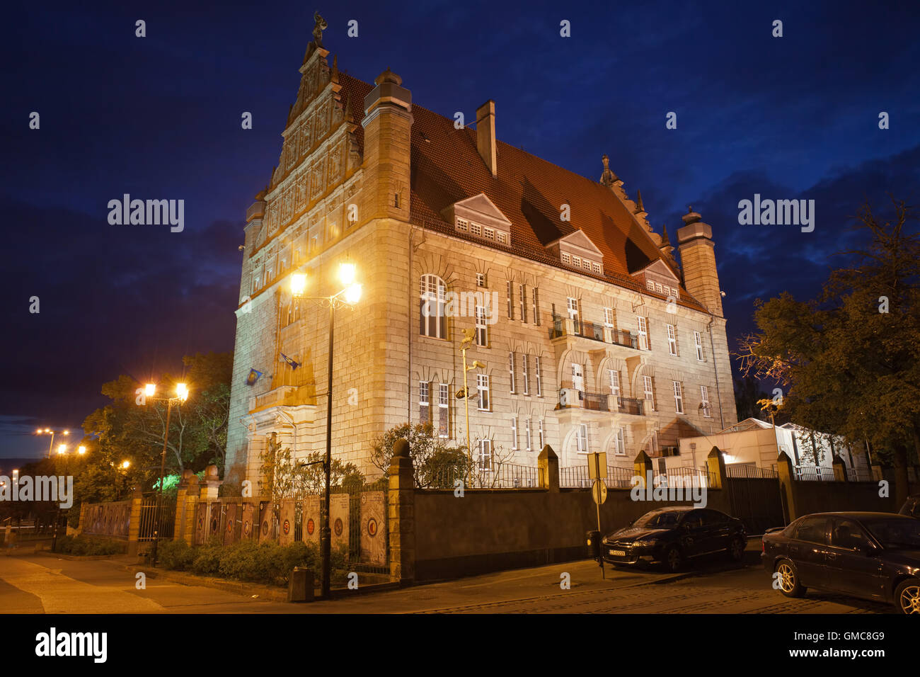 Poland, city of Torun, Collegium Maximum UMK of Nicolaus Copernicus University at night Stock Photo