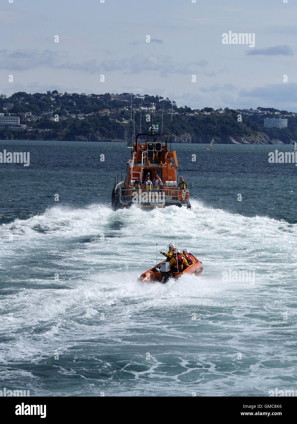 Lifeboat action on the sea Tor Bay,Devon Stock Photo