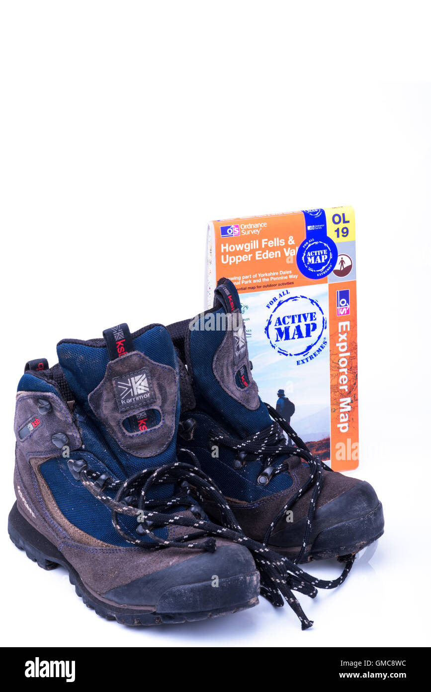 Pair of walking boots with an ordnance survey map. Stock Photo