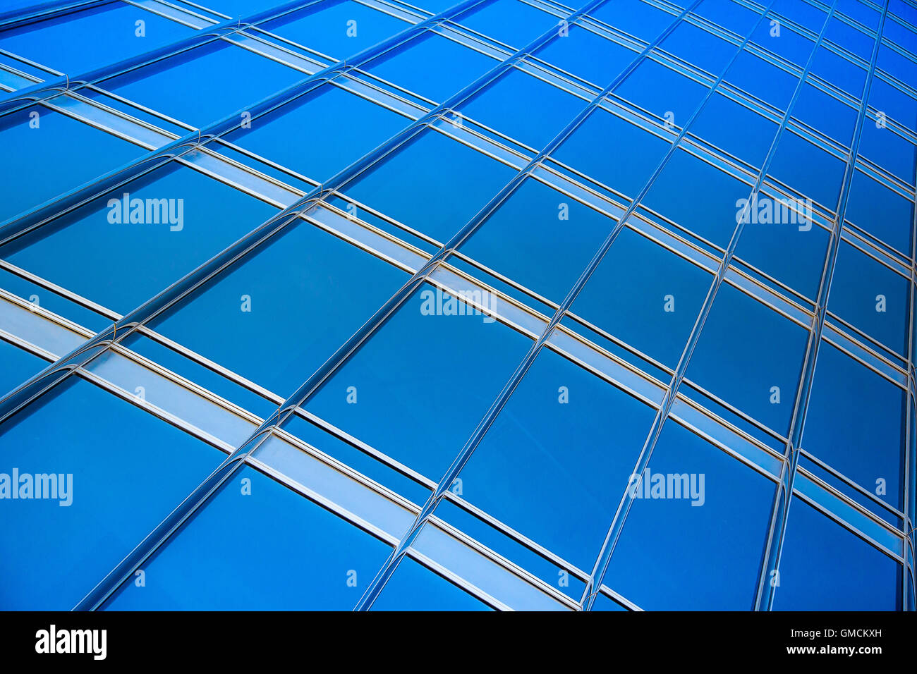 modern blue glass wall of skyscraper Stock Photo Alamy