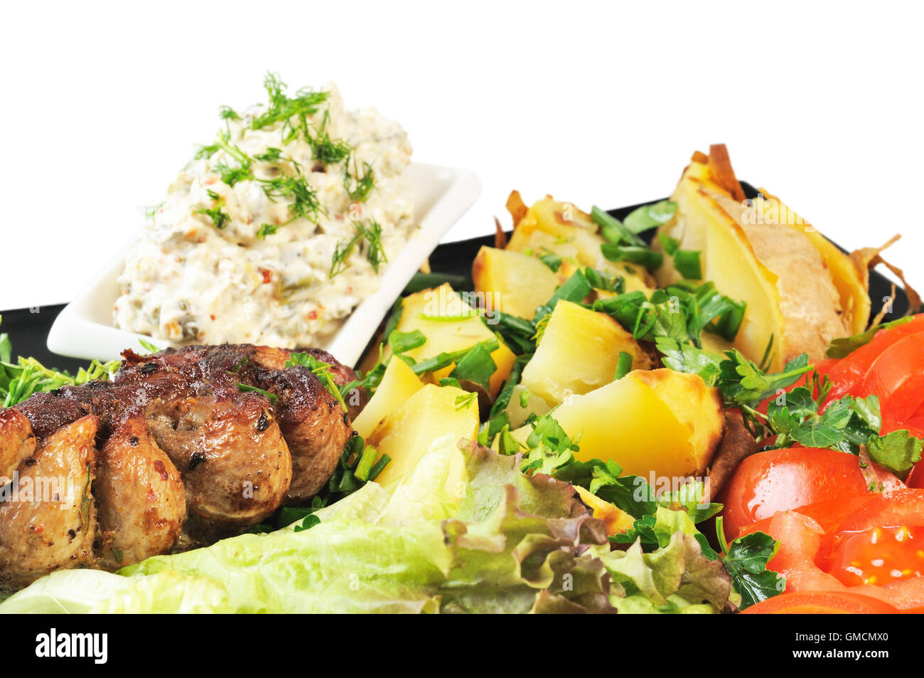 grilled-meat-and-potatoes-stock-photo-alamy