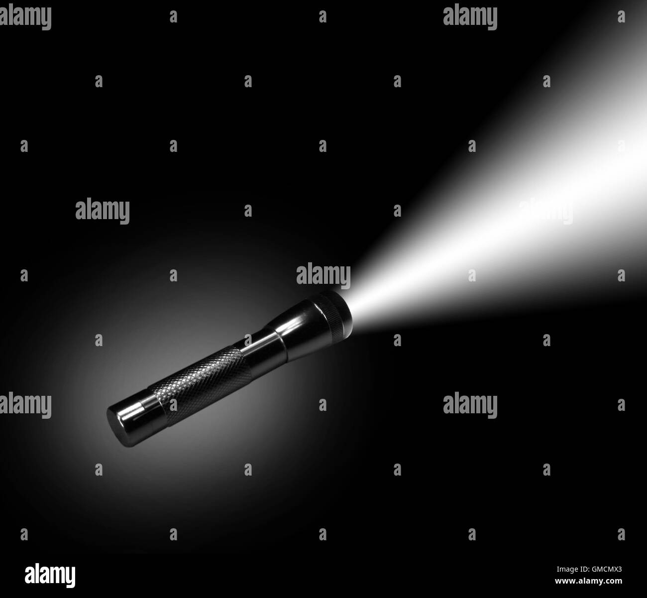 Aluminum flashlight in night Stock Photo Alamy