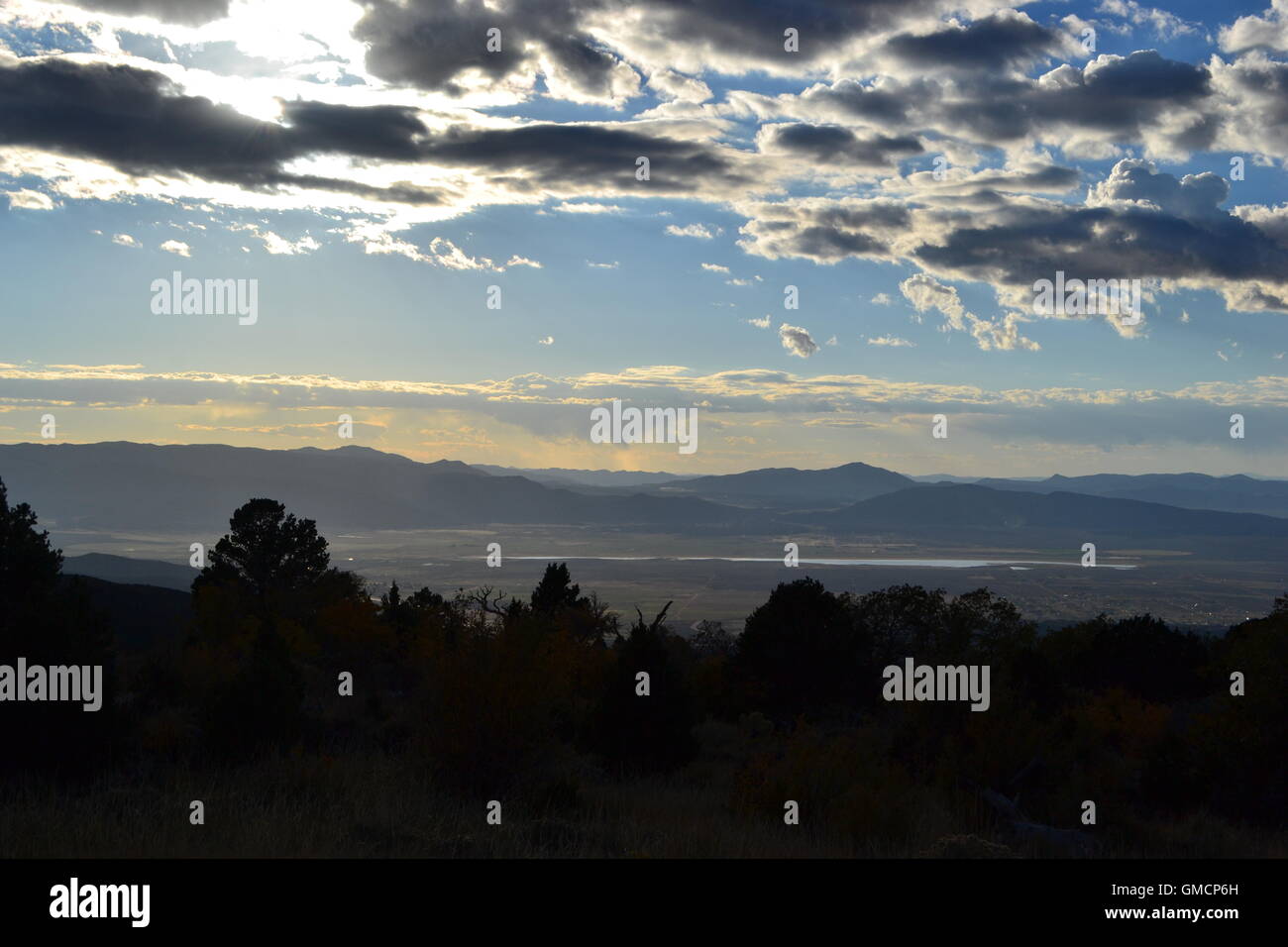 Clouds on the mountain range Stock Photo - Alamy