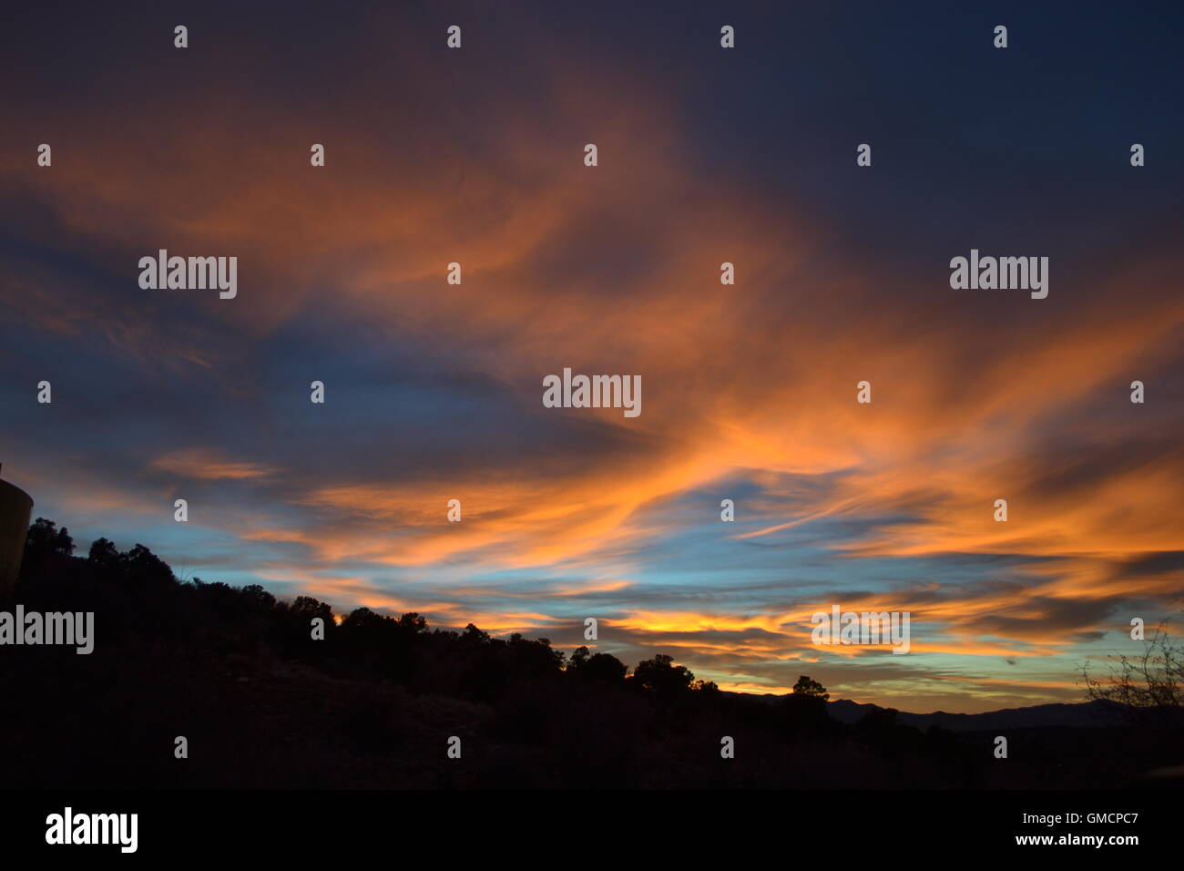 Sunset, orange against blue Stock Photo