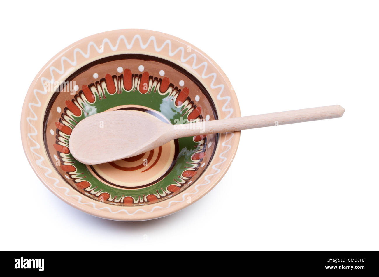 Empty plate with ornaments and wooden spoon Stock Photo - Alamy