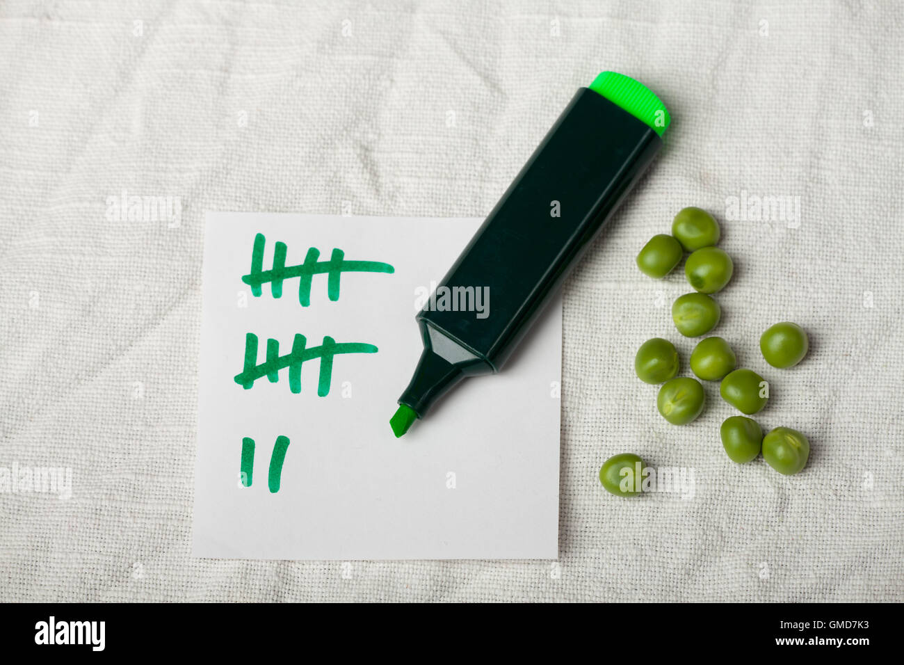 peas and a tally sheet Stock Photo