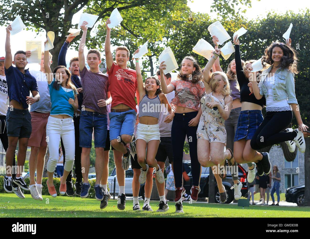 Pupils celebrate after receiving their GCSE results at Brighton College ...