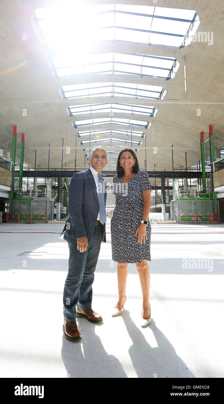 Mayor of London Sadiq Khan and the Mayor of Paris Anne Hidalgo, pose for photographers following a press conference at Station F, Paris, which when completed will be the largest start up business incubator in the world. Stock Photo