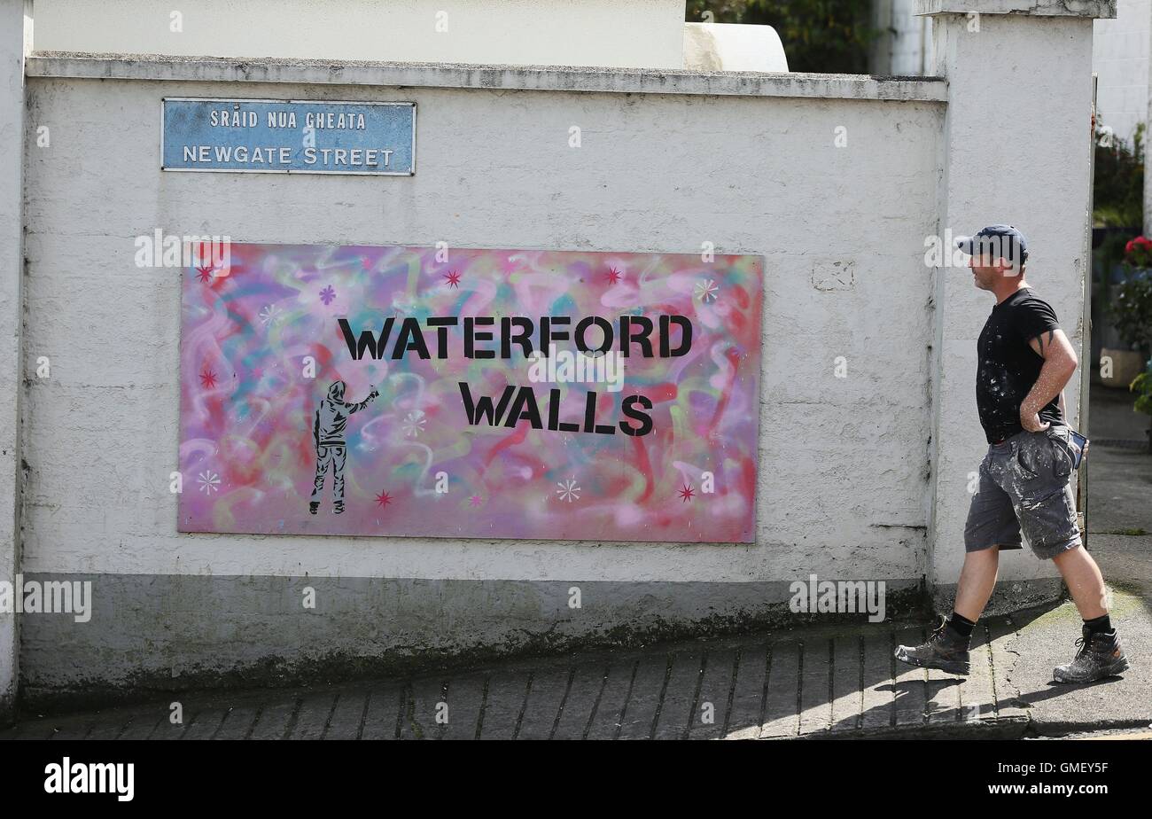 A sign on Newgate street for the Waterford Walls graffiti and street