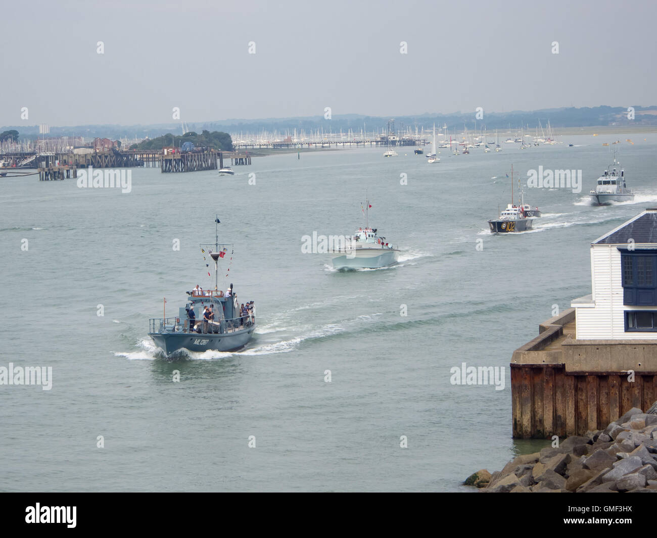 Portsmouth, UK, August 25th 2016. Harbour defence motor launch 1387 leads the way as five Coastal defence boats conduct a sail past of Portsmouth dockyard to mark the centenary of the Royal Navy coastal force Credit:  simon evans/Alamy Live News Stock Photo
