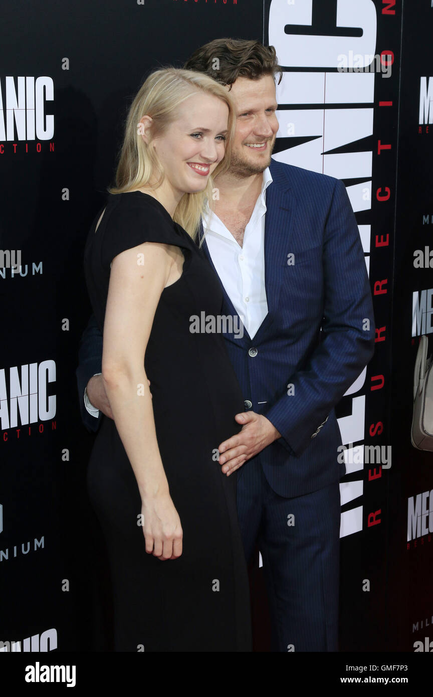Hollywood, California. 22nd Aug, 2016. Ann Kristin Reese and Dennis Gansel attend the premiere of Summit Entertainment's 'Mechanic: Resurrection' at ArcLight Hollywood on August 22, 2016 in Hollywood, California. | Verwendung weltweit © dpa/Alamy Live News Stock Photo
